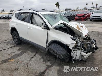 Czwarte zdjęcie samochodu z boku: 2018 TOYOTA RAV4 SE VIN:JTMNFREV7JJ725510 - miniatura
