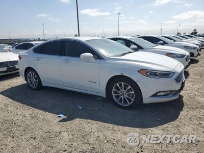 Czwarte zdjęcie samochodu z boku: 2017 FORD FUSION SE HYBRID VIN:3FA6P0LU6HR409707 - miniatura