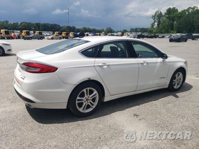 Trzecie zdjęcie samochodu z tyłu: 2018 FORD FUSION SE HYBRID VIN:3FA6P0LU1JR287005 - miniatura
