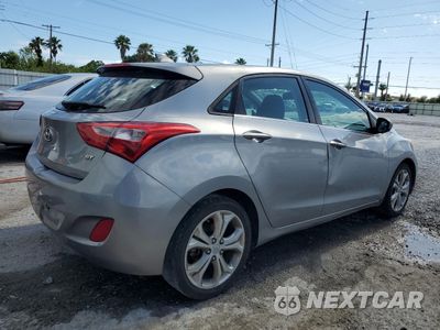 Trzecie zdjęcie samochodu z tyłu: 2013 HYUNDAI ELANTRA GT VIN:KMHD35LE9DU078722 - miniatura