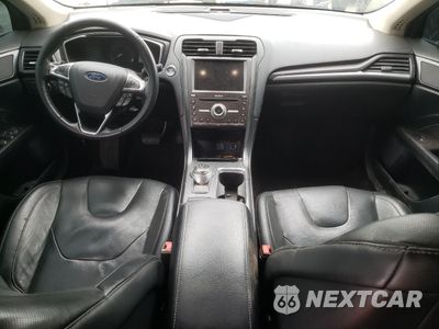 Zdjęcie 8 z 14 samochodu: 2019 FORD FUSION TITANIUM VIN:3FA6P0D91KR240715 - miniatura