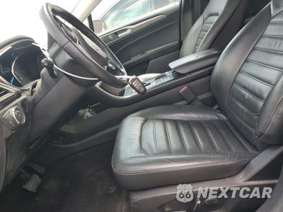 Zdjęcie 7 z 13 samochodu: 2018 FORD FUSION SE HYBRID VIN:3FA6P0LU2JR172106 - miniatura