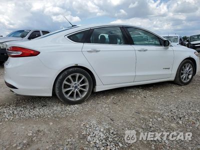 Trzecie zdjęcie samochodu z tyłu: 2017 FORD FUSION SE HYBRID VIN:3FA6P0LU5HR409102 - miniatura