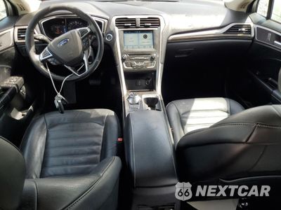 Zdjęcie 8 z 12 samochodu: 2017 FORD FUSION SE HYBRID VIN:3FA6P0LU3HR359591 - miniatura