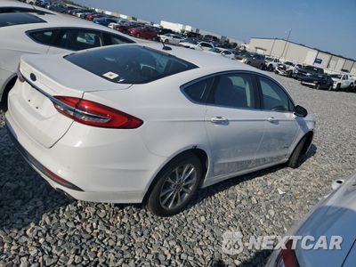 Trzecie zdjęcie samochodu z tyłu: 2017 FORD FUSION SE HYBRID VIN:3FA6P0LU2HR410143 - miniatura