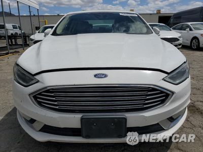 Piąte zdjęcie samochodu w środku: 2017 FORD FUSION SE HYBRID VIN:3FA6P0LU5HR409701 - miniatura