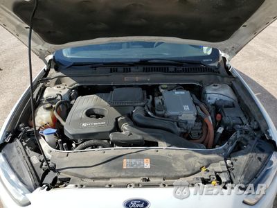 Zdjęcie 12 z 13 samochodu: 2016 FORD FUSION SE HYBRID VIN:3FA6P0LUXGR208343 - miniatura