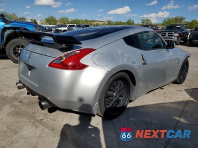 Trzecie zdjęcie samochodu z tyłu: 2014 NISSAN 370Z BASE VIN:JN1AZ4EH1EM632847 - miniatura