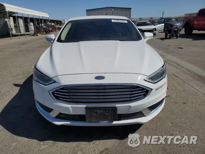 Piąte zdjęcie samochodu w środku: 2018 FORD FUSION SE HYBRID VIN:3FA6P0LU9JR152452 - miniatura