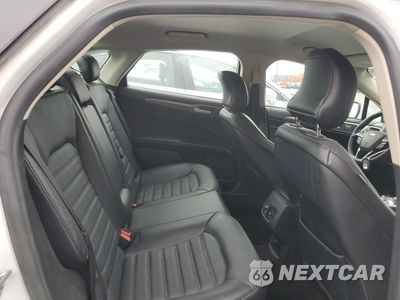 Zdjęcie 10 z 13 samochodu: 2017 FORD FUSION SE HYBRID VIN:3FA6P0LU2HR409753 - miniatura