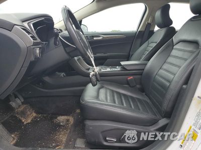 Zdjęcie 7 z 12 samochodu: 2017 FORD FUSION SE HYBRID VIN:3FA6P0LU8HR400751 - miniatura