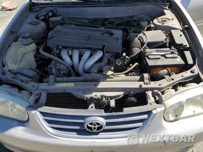 Zdjęcie 11 z 12 samochodu: 2002 TOYOTA COROLLA CE VIN:1NXBR12E92Z567327 - miniatura
