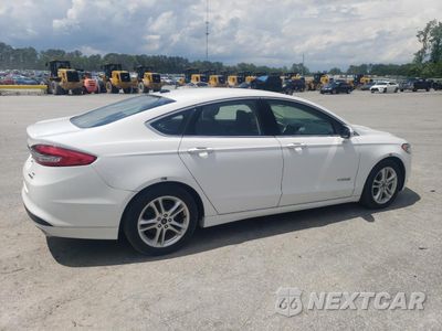 Trzecie zdjęcie samochodu z tyłu: 2018 FORD FUSION SE HYBRID VIN:3FA6P0LU4JR171989 - miniatura