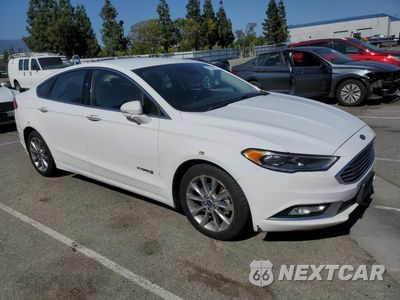 Czwarte zdjęcie samochodu z boku: 2017 FORD FUSION SE HYBRID VIN:3FA6P0LU3HR409759 - miniatura