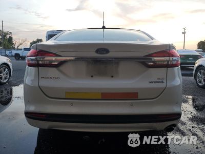 Zdjęcie 6 z 12 samochodu: 2017 FORD FUSION SE HYBRID VIN:3FA6P0LU5HR409648 - miniatura
