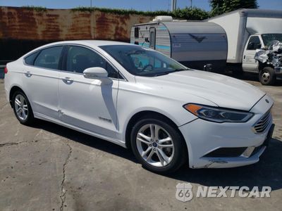 Czwarte zdjęcie samochodu z boku: 2018 FORD FUSION SE HYBRID VIN:3FA6P0LU0JR172122 - miniatura