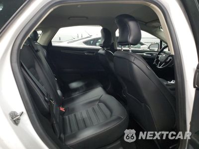 Zdjęcie 10 z 13 samochodu: 2018 FORD FUSION SE HYBRID VIN:3FA6P0LU9JR118799 - miniatura