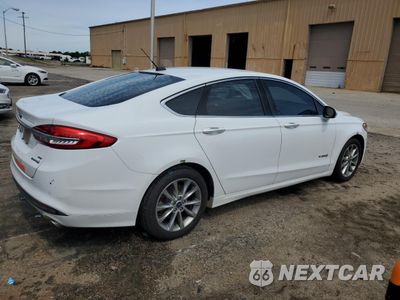 Trzecie zdjęcie samochodu z tyłu: 2017 FORD FUSION SE HYBRID VIN:3FA6P0LU2HR400700 - miniatura