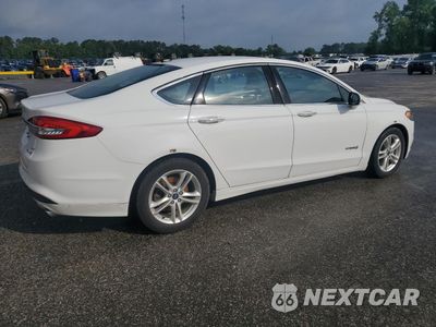 Trzecie zdjęcie samochodu z tyłu: 2018 FORD FUSION SE HYBRID VIN:3FA6P0LU5JR281918 - miniatura