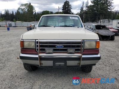 Piąte zdjęcie samochodu w środku: 1991 FORD F150 VIN:1FTEX14N9MKA86898 - miniatura