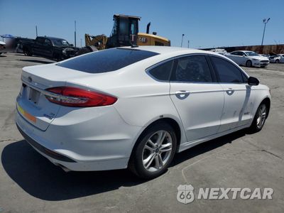 Trzecie zdjęcie samochodu z tyłu: 2018 FORD FUSION SE HYBRID VIN:3FA6P0LU2JR118675 - miniatura