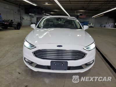 Piąte zdjęcie samochodu w środku: 2017 FORD FUSION SE HYBRID VIN:3FA6P0LU2HR409414 - miniatura