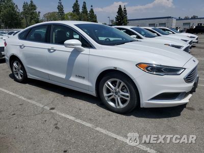 Czwarte zdjęcie samochodu z boku: 2018 FORD FUSION SE HYBRID VIN:3FA6P0LU9JR172118 - miniatura