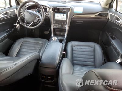 Zdjęcie 8 z 12 samochodu: 2017 FORD FUSION SE HYBRID VIN:3FA6P0LU4HR410046 - miniatura
