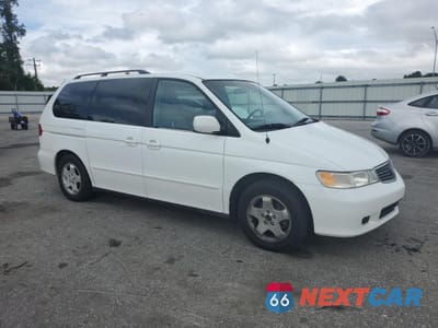 Czwarte zdjęcie samochodu z boku: 2000 HONDA ODYSSEY EX VIN:2HKRL1878YH559901 - miniatura