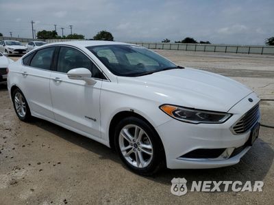 Czwarte zdjęcie samochodu z boku: 2018 FORD FUSION SE HYBRID VIN:3FA6P0LU8JR129972 - miniatura