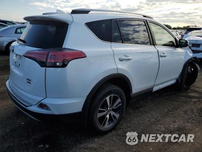 Trzecie zdjęcie samochodu z tyłu: 2017 TOYOTA RAV4 XLE VIN:JTMRFREV6HJ713960 - miniatura