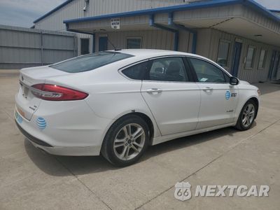 Trzecie zdjęcie samochodu z tyłu: 2018 FORD FUSION SE HYBRID VIN:3FA6P0LU8JR118762 - miniatura