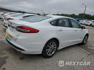 Trzecie zdjęcie samochodu z tyłu: 2017 FORD FUSION SE HYBRID VIN:3FA6P0LU7HR410137 - miniatura