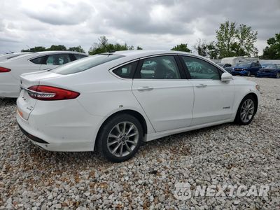Trzecie zdjęcie samochodu z tyłu: 2017 FORD FUSION SE HYBRID VIN:3FA6P0LU4HR409740 - miniatura