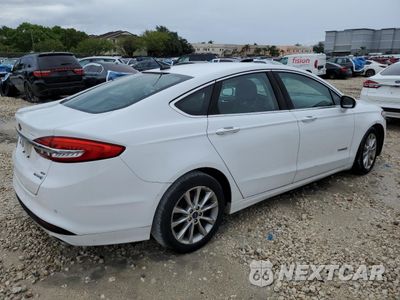 Trzecie zdjęcie samochodu z tyłu: 2017 FORD FUSION SE HYBRID VIN:3FA6P0LU6HR359598 - miniatura