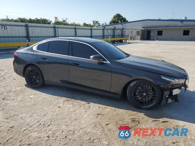 Czwarte zdjęcie samochodu z boku: 2024 BMW 530 I VIN:WBA43FJ08RCP97052 - miniatura