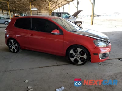 Czwarte zdjęcie samochodu z boku: 2010 VOLKSWAGEN GTI VIN:WVWED7AJ7AW252353 - miniatura