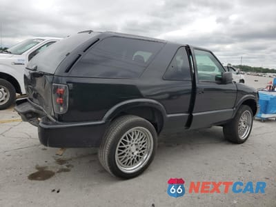 Trzecie zdjęcie samochodu z tyłu: 2000 GMC JIMMY VIN:1GKCS18W2YK221142 - miniatura