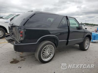 Trzecie zdjęcie samochodu z tyłu: 2000 GMC JIMMY VIN:1GKCS18W2YK221142 - miniatura