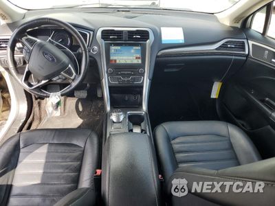 Zdjęcie 8 z 13 samochodu: 2018 FORD FUSION SE HYBRID VIN:3FA6P0LU2JR129921 - miniatura