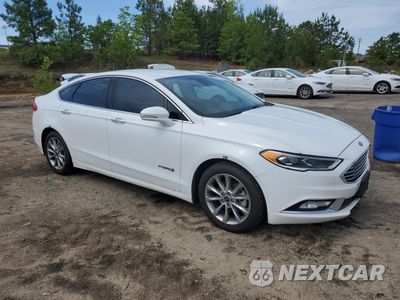 Czwarte zdjęcie samochodu z boku: 2017 FORD FUSION SE HYBRID VIN:3FA6P0LU2HR400700 - miniatura