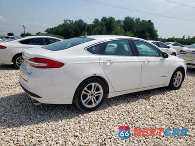 Trzecie zdjęcie samochodu z tyłu: 2018 FORD FUSION SE HYBRID VIN:3FA6P0LUXJR171575 - miniatura