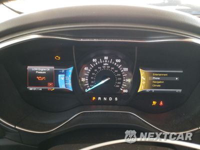 Zdjęcie 9 z 14 samochodu: 2014 FORD FUSION TITANIUM VIN:3FA6P0K92ER344069 - miniatura