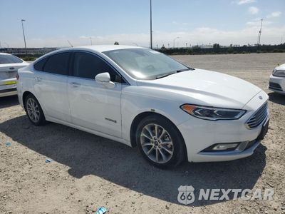 Czwarte zdjęcie samochodu z boku: 2017 FORD FUSION SE HYBRID VIN:3FA6P0LU0HR409699 - miniatura
