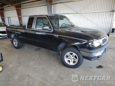 Czwarte zdjęcie samochodu z boku: 2000 MAZDA B3000 TROY LEE EDITION VIN:4F4YR16V7YTM19949 - miniatura