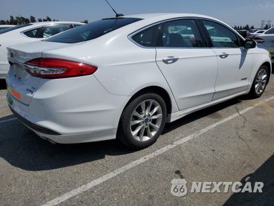 Trzecie zdjęcie samochodu z tyłu: 2017 FORD FUSION SE HYBRID VIN:3FA6P0LU0HR409766 - miniatura