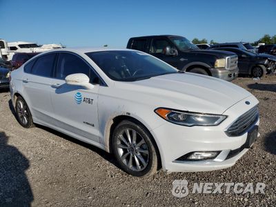 Czwarte zdjęcie samochodu z boku: 2017 FORD FUSION SE HYBRID VIN:3FA6P0LU4HR409012 - miniatura