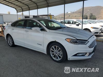 Czwarte zdjęcie samochodu z boku: 2017 FORD FUSION SE HYBRID VIN:3FA6P0LU7HR400708 - miniatura