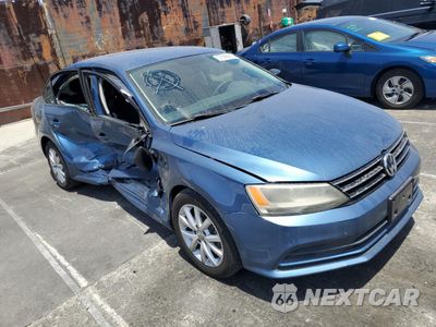 Czwarte zdjęcie samochodu z boku: 2015 VOLKSWAGEN JETTA SE VIN:3VWD17AJ6FM419312 - miniatura