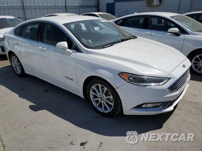Czwarte zdjęcie samochodu z boku: 2017 FORD FUSION SE HYBRID VIN:3FA6P0LU1HR408917 - miniatura